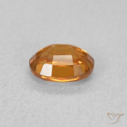 Circón Naranja oscuro natural de 0.67 ct, Ovalada, VVS