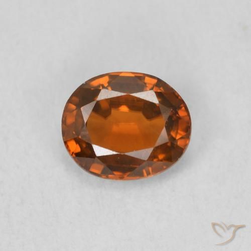0.87ct Natural Naranja oscuro Circón, Ovalada, VVS