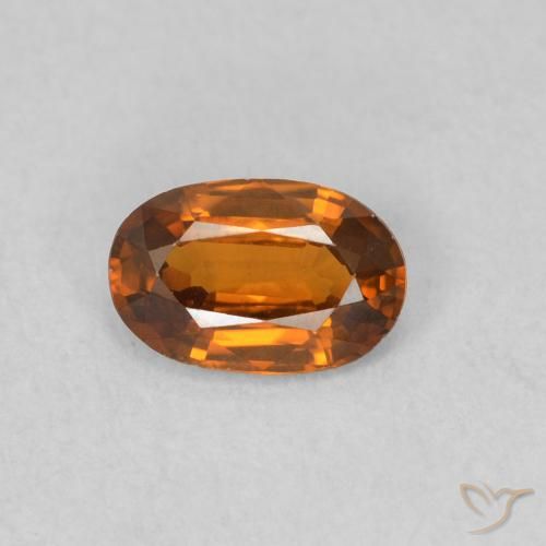 0.62ct Natural Naranja medio Circón, Ovalada, VVS