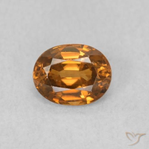 0.59ct Natural Marrón naranja Circón, Ovalada, VVS-VS