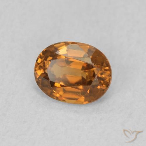 Circón Marrón naranja natural de 0.59 ct, Ovalada, VVS-VS