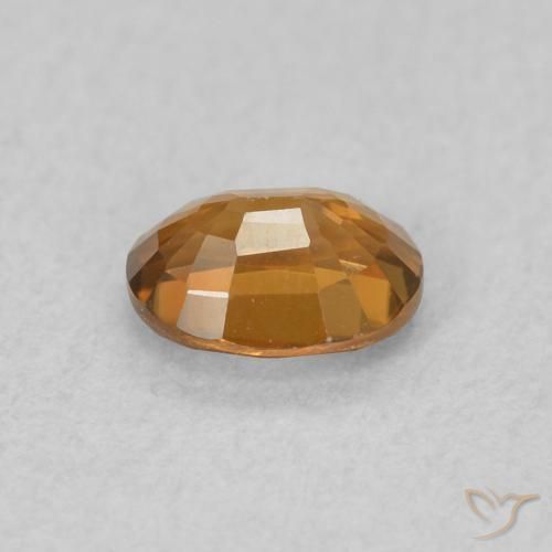 Circón Marrón naranja natural de 0.59 ct, Ovalada, VVS-VS