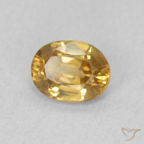 Circón champaña natural de 0.64 ct, Ovalada, VVS