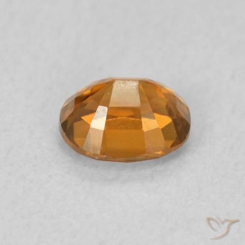 Circón Naranja medio natural de 0.68 ct, Ovalada, VVS