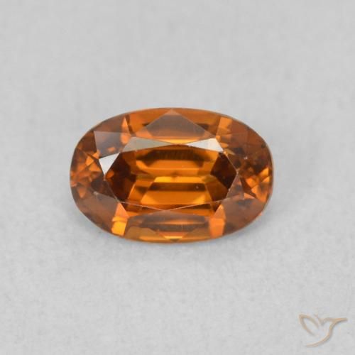 0.77ct Natural Naranja oscuro Circón, Ovalada, VVS-VS