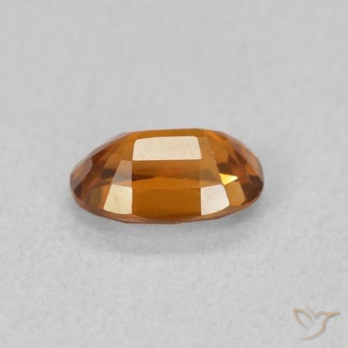 Circón Naranja oscuro natural de 0.77 ct, Ovalada, VVS-VS