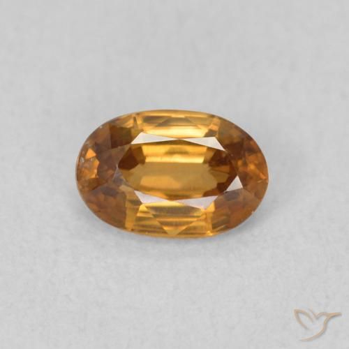 0.70ct Natural Naranja óxido Circón, Ovalada, VVS-VS