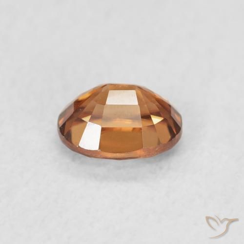 Circón Naranja oscuro natural de 0.63 ct, Ovalada, VVS