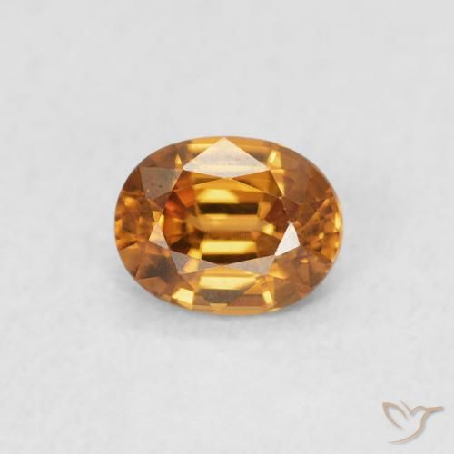 0.61ct Natural Naranja oscuro Circón, Ovalada, VVS
