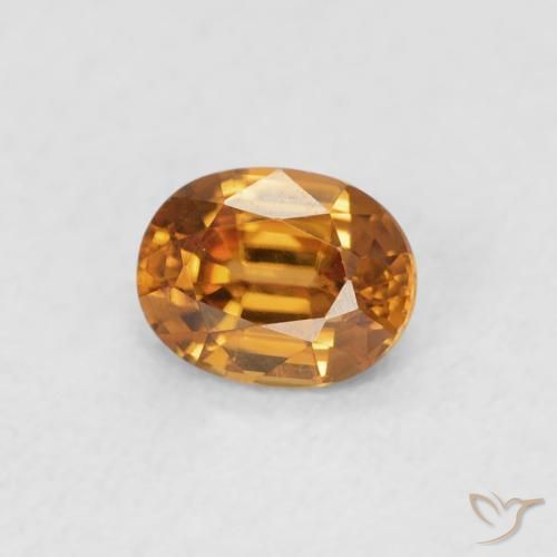 Circón Naranja oscuro natural de 0.61 ct, Ovalada, VVS
