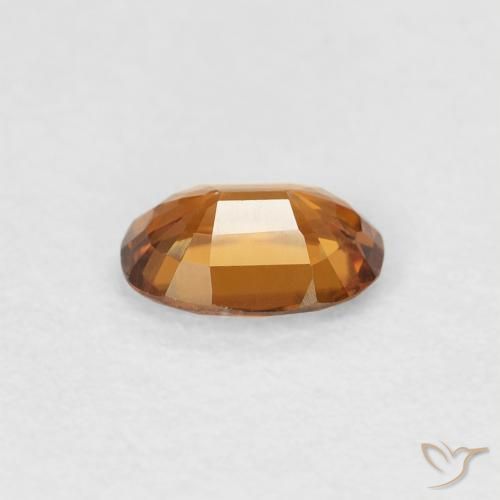 Circón Marrón naranja natural de 0.65 ct, Ovalada, VVS-VS