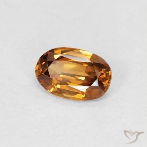Circón Marrón naranja natural de 0.68 ct, Ovalada, VVS-VS