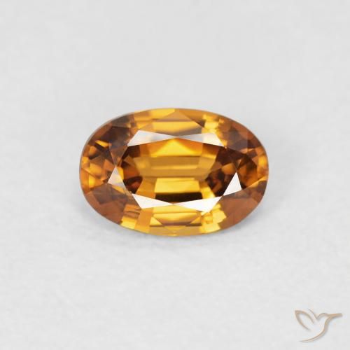 0.69ct Natural Naranja medio Circón, Ovalada, VVS-VS