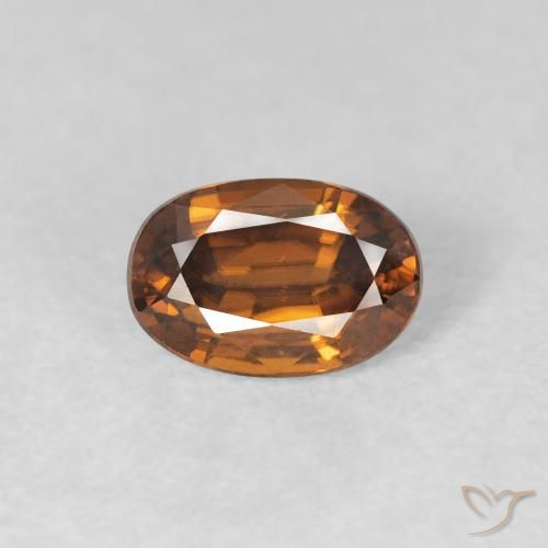 0.86ct Natural Naranja marrón Circón, Ovalada, VVS
