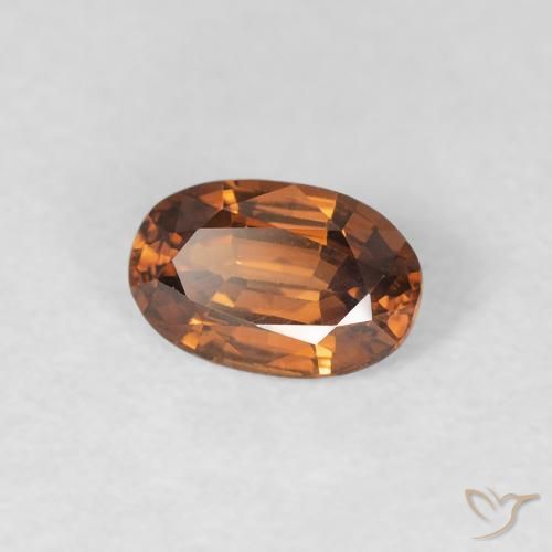 Circón Naranja marrón intenso natural de 0.67 ct, Ovalada, VVS