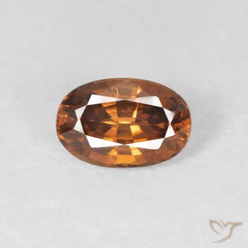 0.84ct Natural Naranja oscuro Circón, Ovalada, VVS-VS