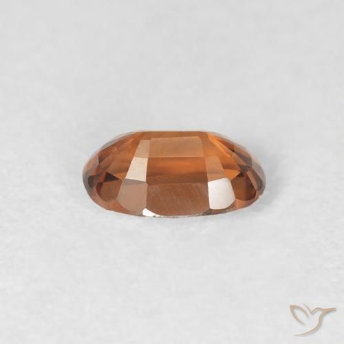 Circón Naranja oscuro natural de 0.69 ct, Ovalada, VVS