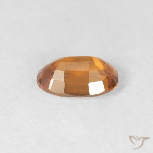 Circón Naranja oscuro natural de 0.75 ct, Ovalada, VVS