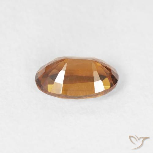 Circón Marrón naranja natural de 0.69 ct, Ovalada, VVS