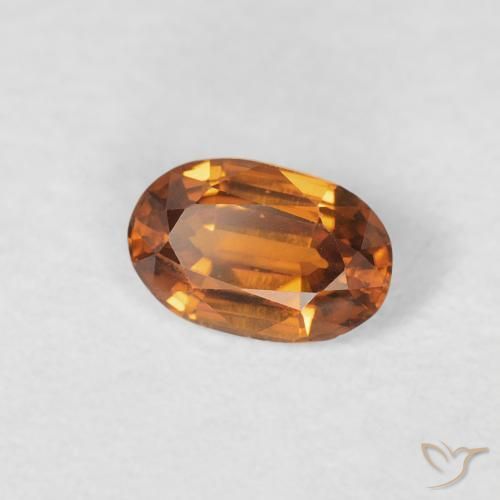 Circón Medium Dark-Orange natural de 0.71 ct, Ovalada, VVS