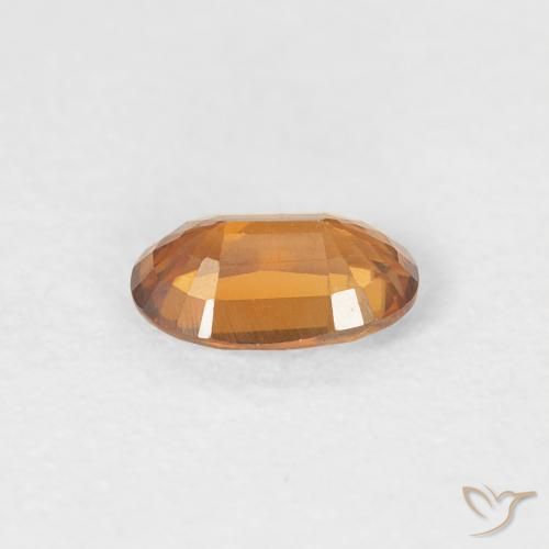 Circón Naranja medio natural de 0.63 ct, Ovalada, VVS-VS
