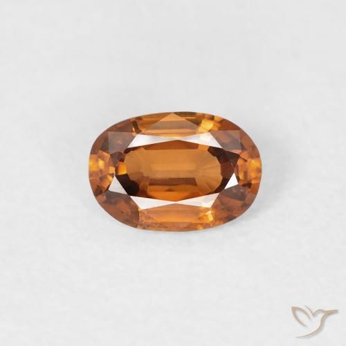 0.55ct Natural Naranja marrón Circón, Ovalada, VVS