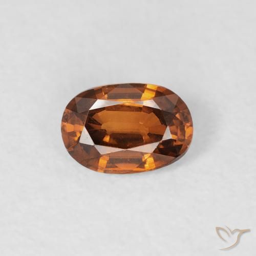 0.64ct Natural Naranja oscuro Circón, Ovalada, VVS