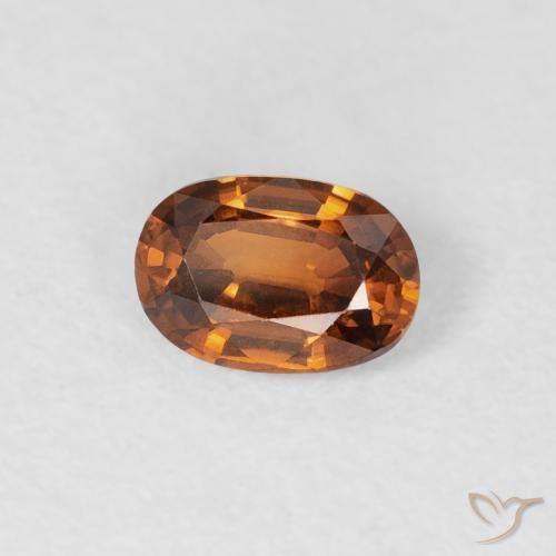 Circón Naranja oscuro natural de 0.64 ct, Ovalada, VVS