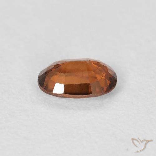 Circón Naranja oscuro natural de 0.64 ct, Ovalada, VVS