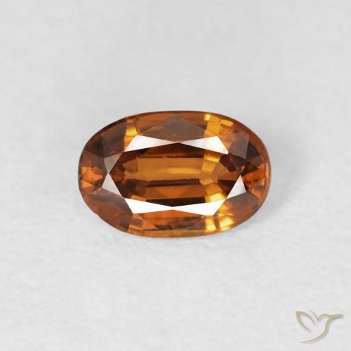 0.70ct Natural Naranja oscuro Circón, Ovalada, VS