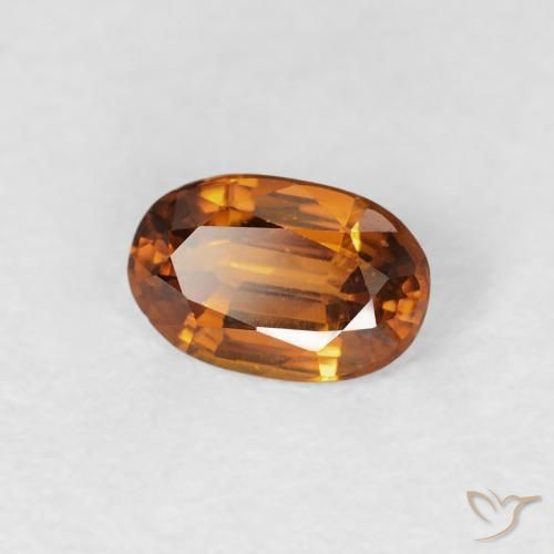 Circón Naranja oscuro natural de 0.70 ct, Ovalada, VS