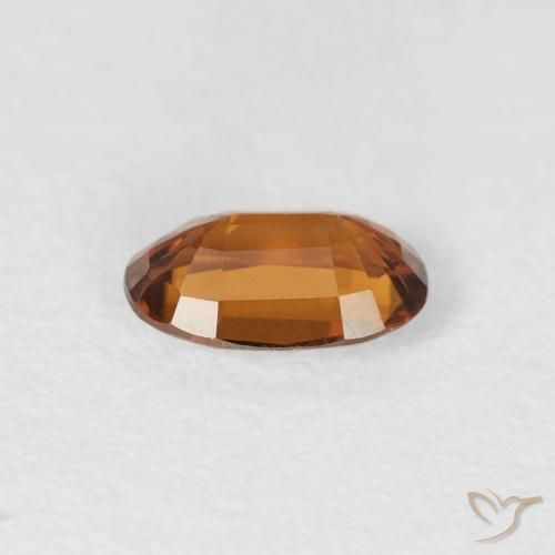 Circón Naranja oscuro natural de 0.70 ct, Ovalada, VS