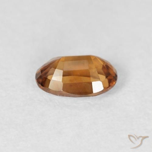 Circón Marrón naranja natural de 0.77 ct, Ovalada, VS
