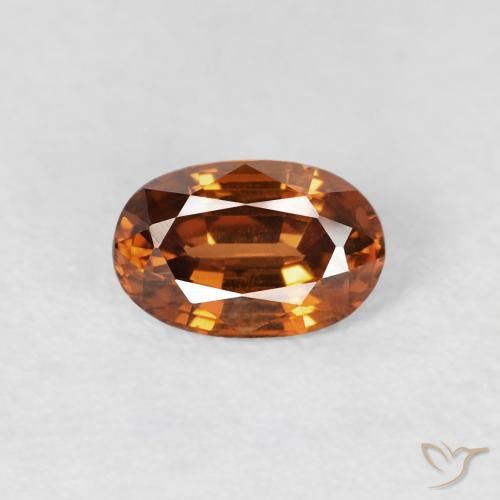 0.72ct Natural Naranja oscuro Circón, Ovalada, VS