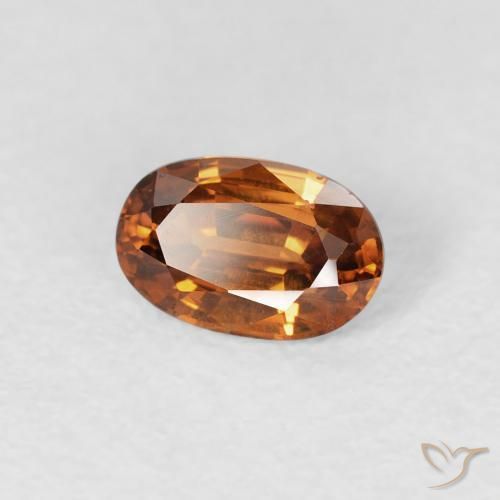 Circón Naranja oscuro natural de 0.72 ct, Ovalada, VS