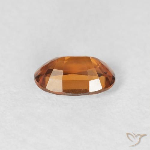 Circón Naranja oscuro natural de 0.72 ct, Ovalada, VS