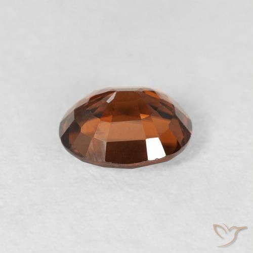 Circón Naranja marrón intenso natural de 0.99 ct, Ovalada, VS