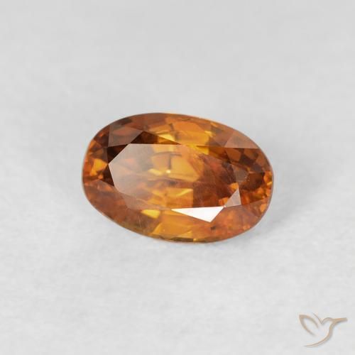 Circón Medium Dark-Orange natural de 0.80 ct, Ovalada, VS