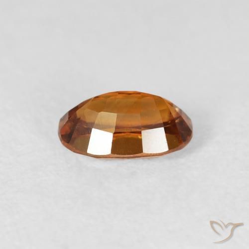 Circón Medium Dark-Orange natural de 0.80 ct, Ovalada, VS