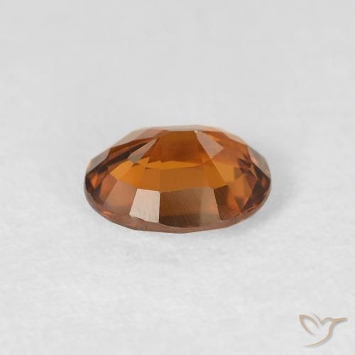 Circón Naranja oscuro natural de 0.88 ct, Ovalada, VS
