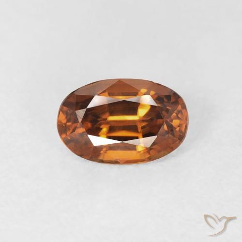 0.77ct Natural Naranja oscuro Circón, Ovalada, VVS