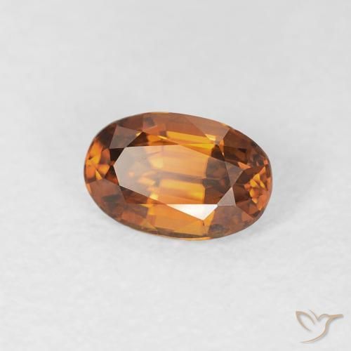 Circón Naranja oscuro natural de 0.77 ct, Ovalada, VVS