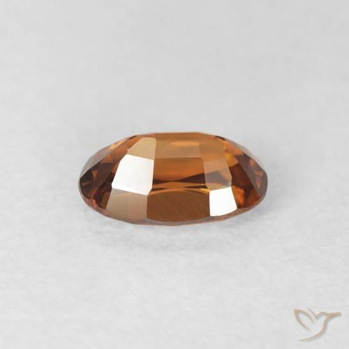Circón Naranja oscuro natural de 0.77 ct, Ovalada, VVS