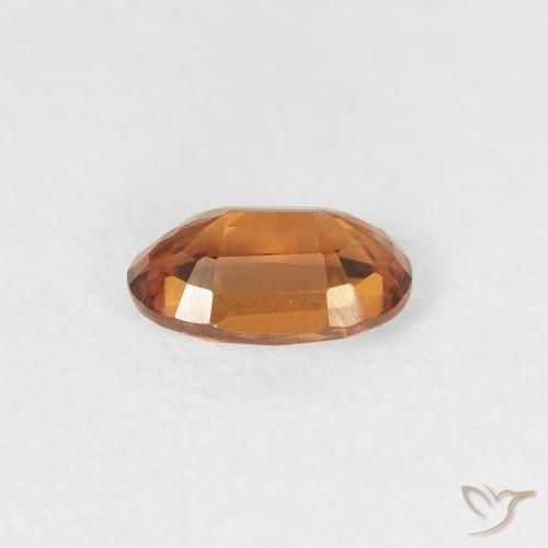 Circón Naranja oscuro natural de 0.64 ct, Ovalada, VVS