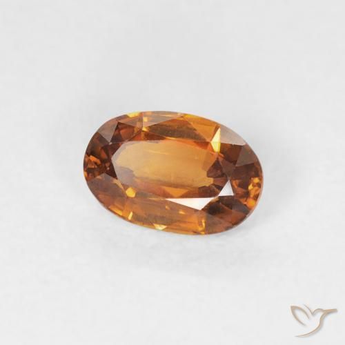 Circón Naranja oscuro natural de 0.68 ct, Ovalada, VVS