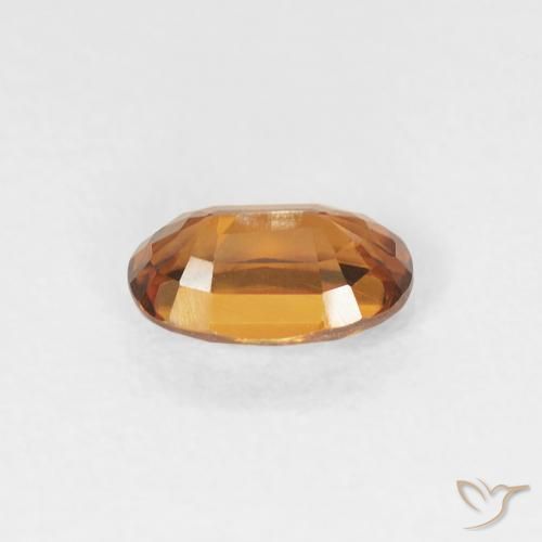 Circón Naranja oscuro natural de 0.68 ct, Ovalada, VVS