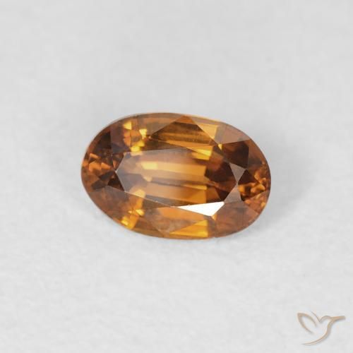 Circón Marrón naranja natural de 0.69 ct, Ovalada, VVS-VS