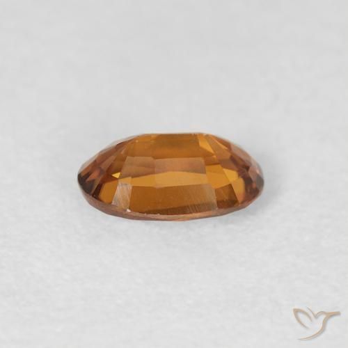 Circón Marrón naranja natural de 0.69 ct, Ovalada, VVS-VS