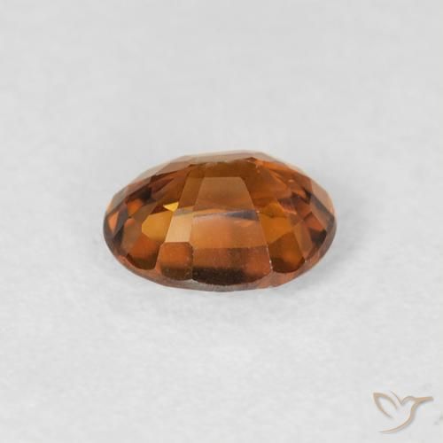 Circón Naranja medio natural de 0.88 ct, Ovalada, VS