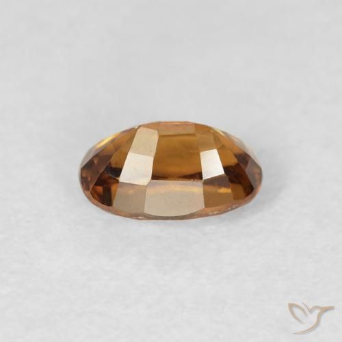 Circón Marrón naranja natural de 0.84 ct, Ovalada, VS